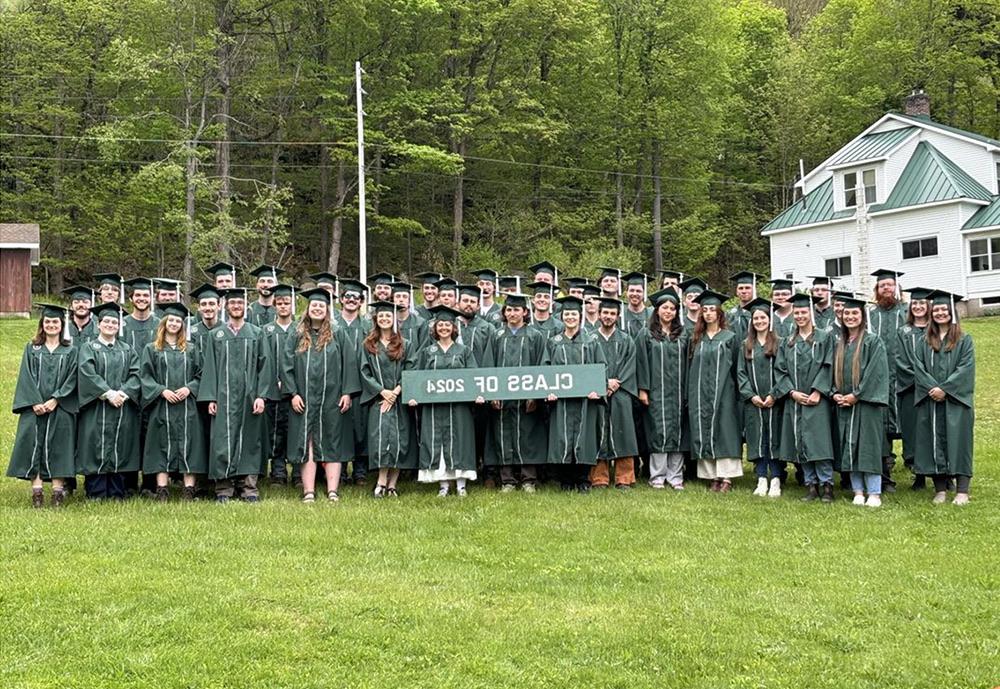 Group of Ranger School graduates holding class of 2024 sign